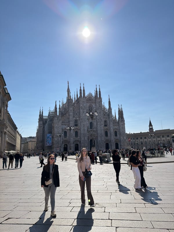 Morning crowds gather at Milan's Duomo on sunny May Day