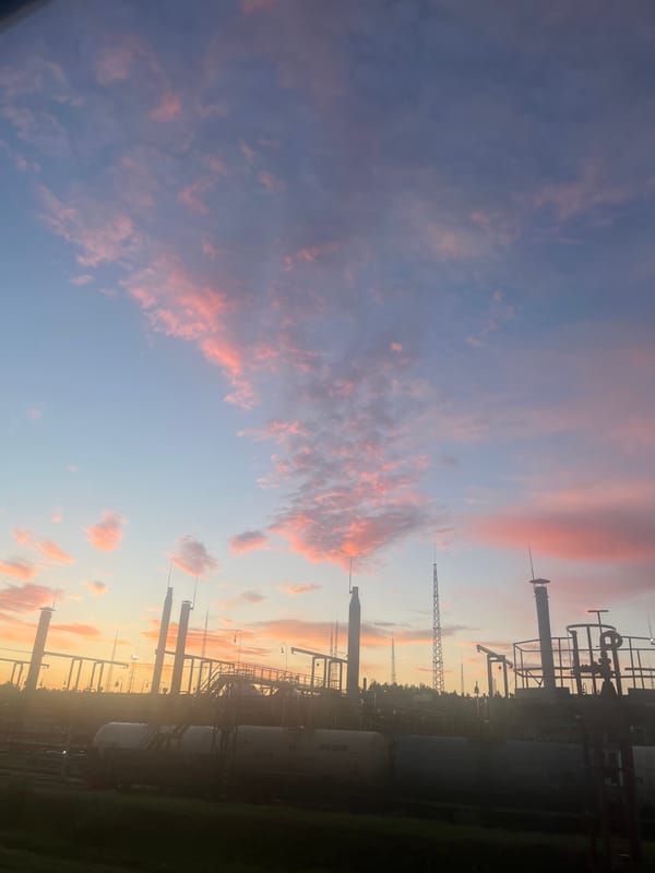 Twilight at a Chernushka rail yard, tank cars and fog
