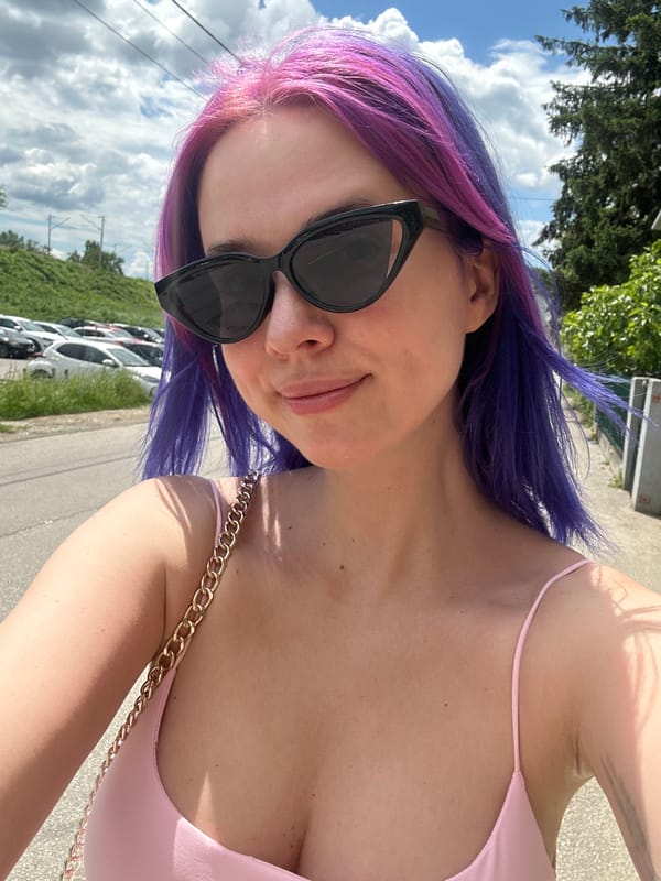 Colorful-haired visitor documents spring blooms during Zagreb morning stroll