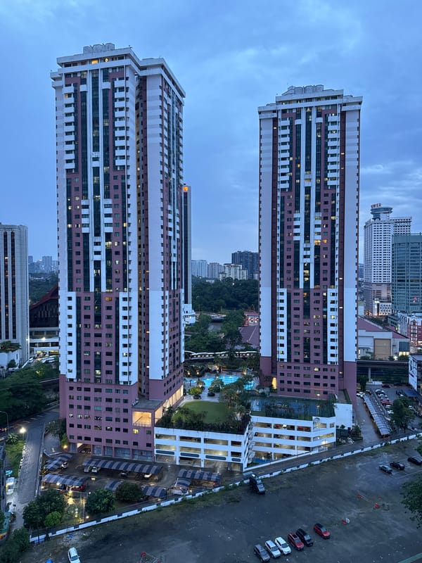 KL high-rise towers caught at dusk and after dark