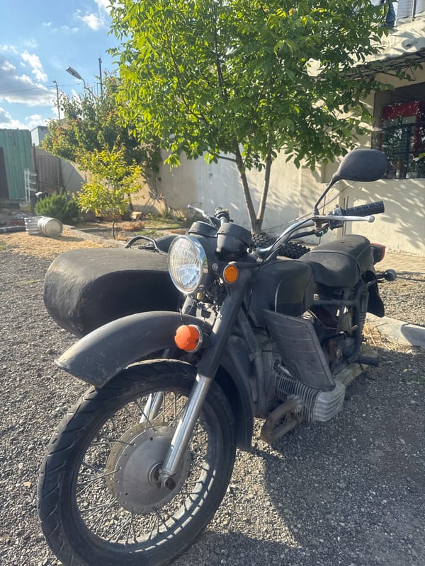 Vintage motorcycles on containers documented near Tbilisi cathedral