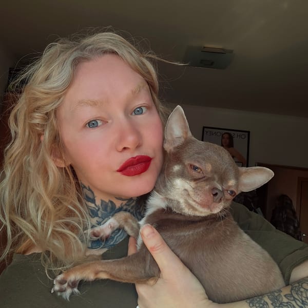 Woman poses with chihuahua in Saint Petersburg portrait