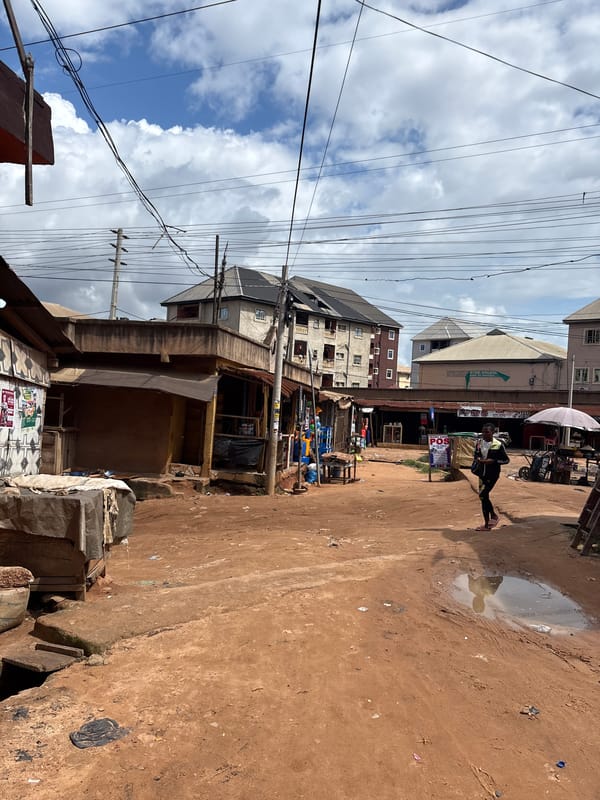 Busy market street and okada traffic in Nkpor, Nigeria