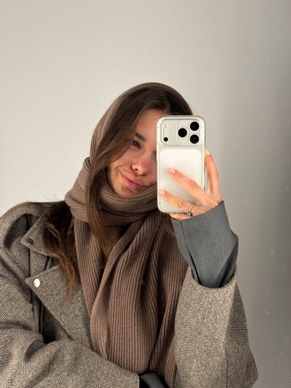 Everyday moments captured in Krasnoyarsk: selfie and street scene