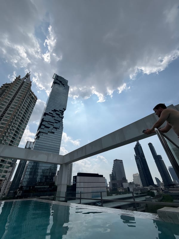 Morning snapshots capture routine Bangkok street life and rooftop leisure