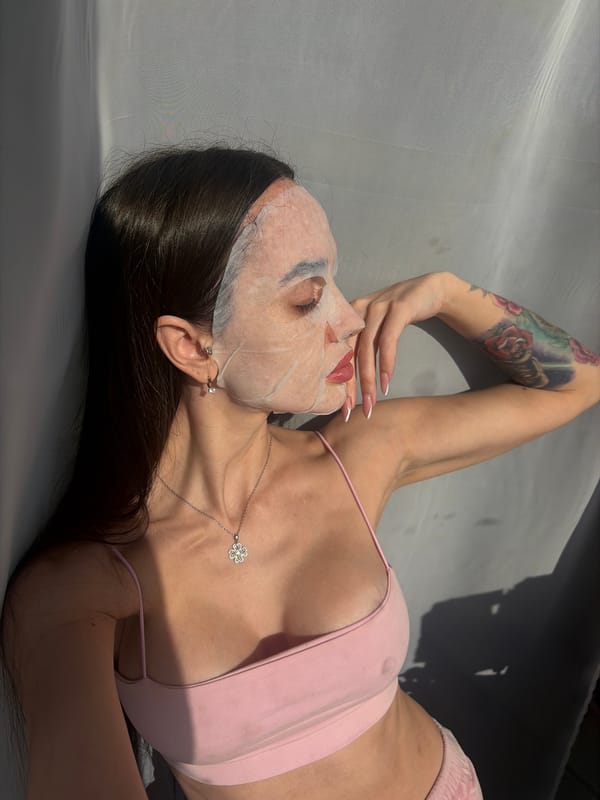 Woman documents morning skincare routine with face masks