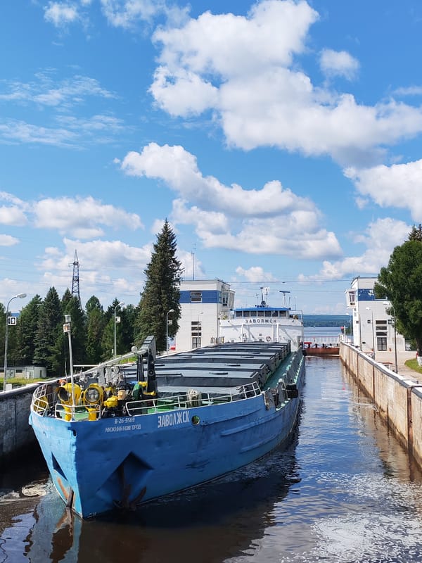 Cargo barge Zavolzhsk transiting a Russian canal lock