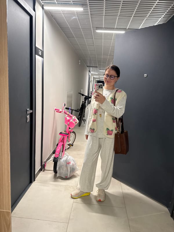 People take selfies in Izhevsk hallway Friday morning
