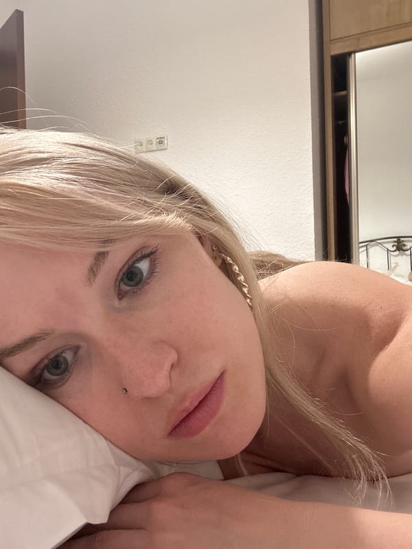 Resting on a white pillow in a Tbilisi bedroom