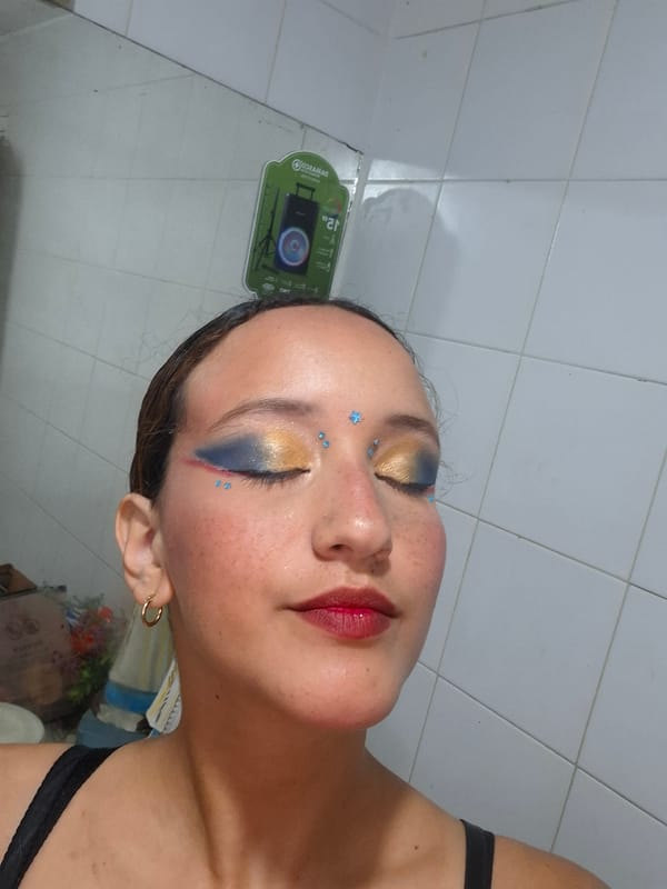 Person with star-accented makeup photographed at Venezuelan beach