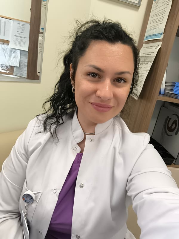 Healthcare worker photographed in office setting in Pleven, Bulgaria