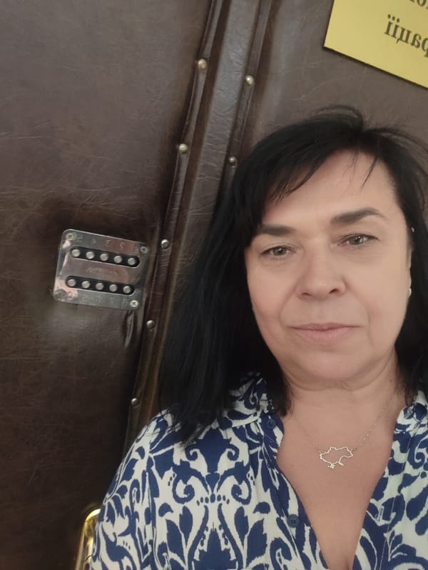 Portrait, elevator selfie, and city skyline from one brief stop