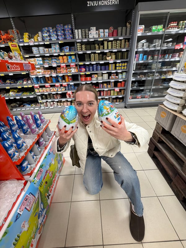 Woman enjoys grocery shopping trip in Riga supermarket