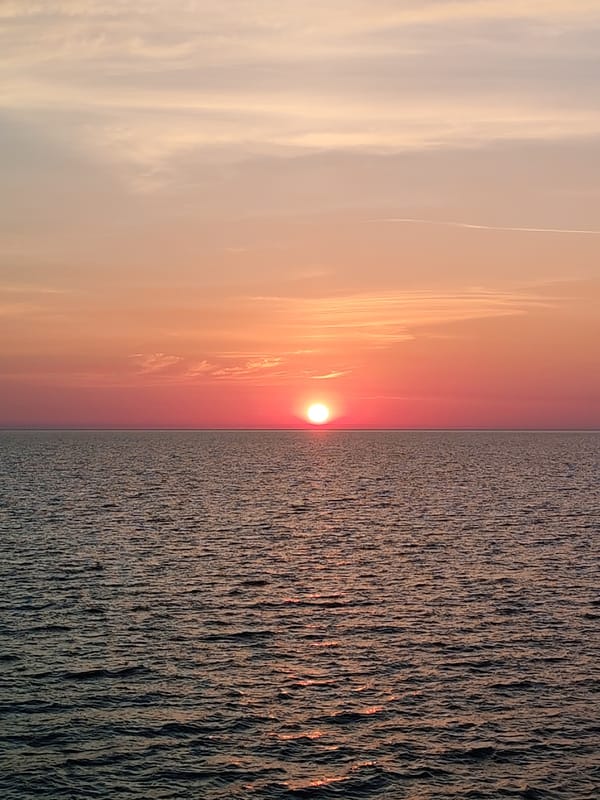 Pastel sunset fades over the Baltic Sea near Shcheleiki