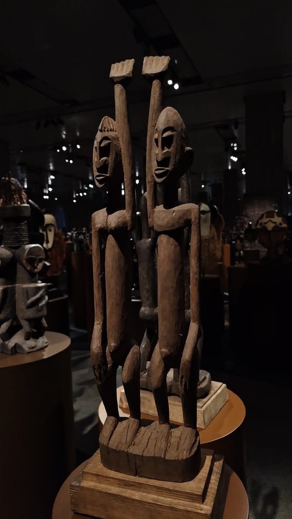 Browsing African tribal art at a Moscow museum