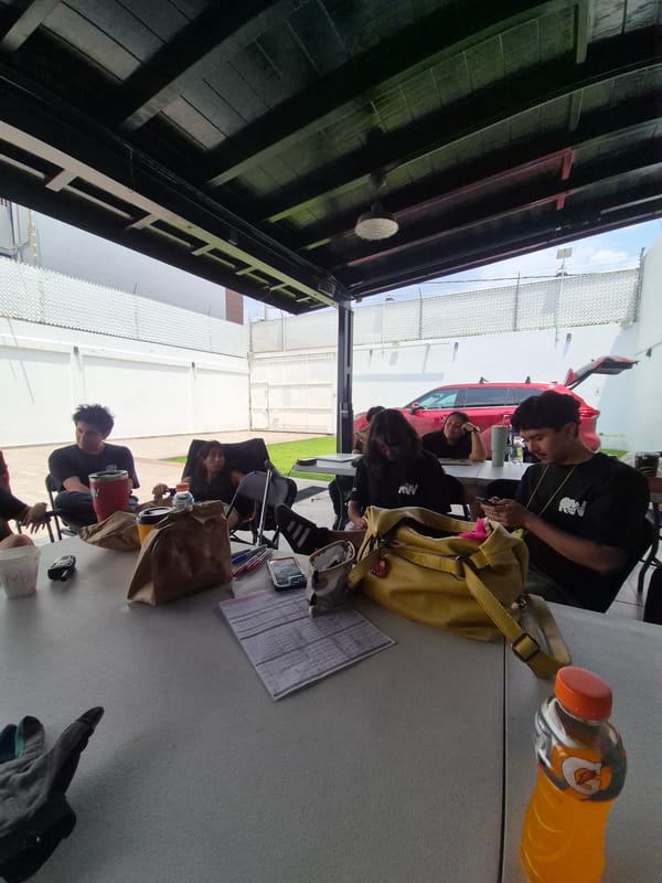 Group gathers at outdoor table in Puebla, Mexico