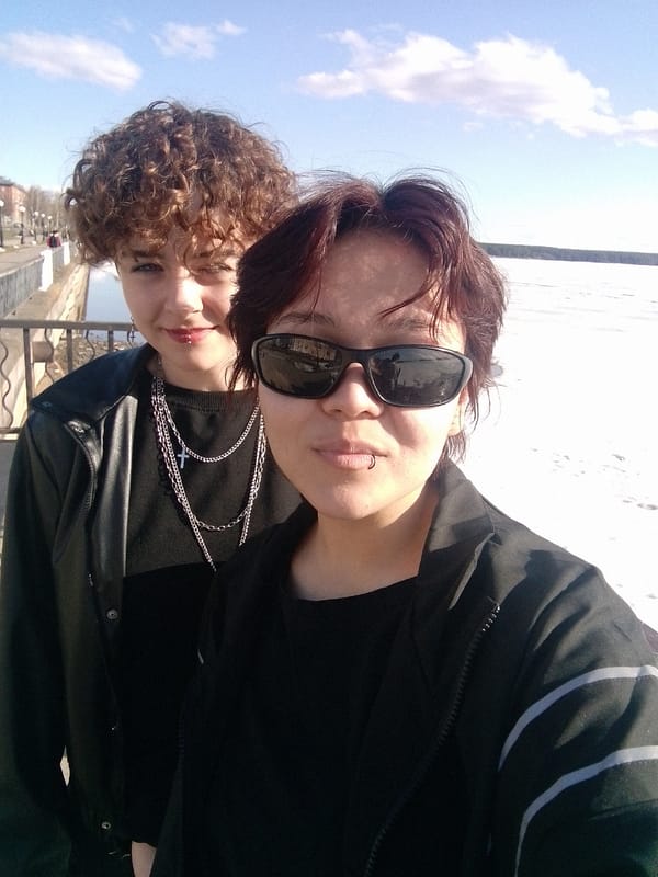 Winter gathering photographed near frozen water in Votkinsk, Russia