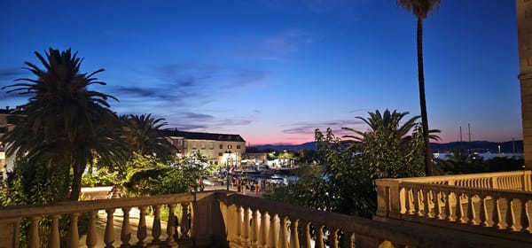 Dusk in Supetar: harbor, bell tower, and stone streets