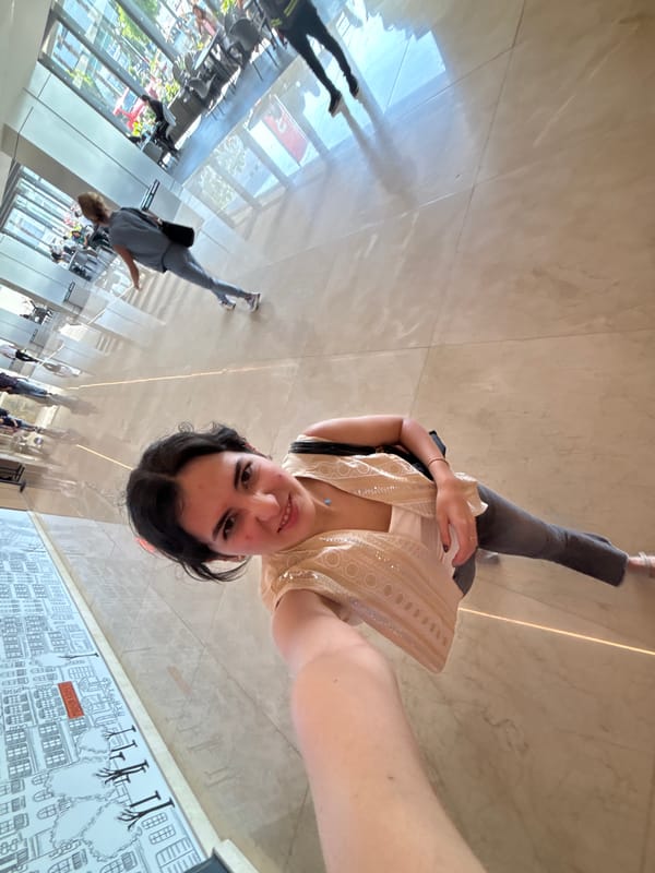 Woman takes selfie in Puebla building