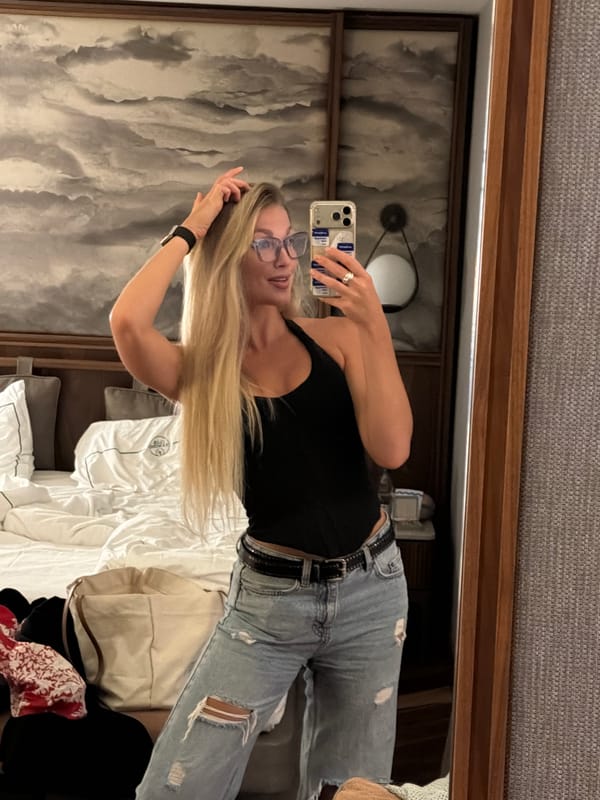 Woman takes mirror selfie in Beldibi, Turkey