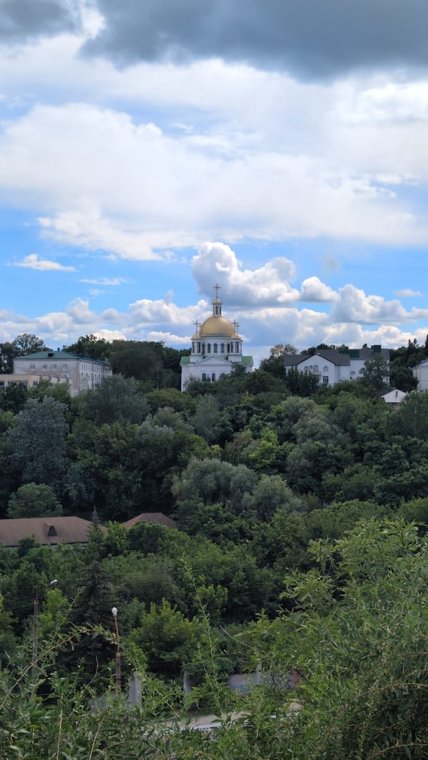 Summer afternoon around Poltava's churches, skyline, and streets