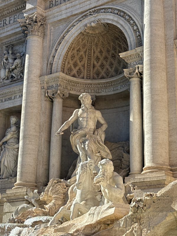 Tourists gather at Rome's iconic Trevi Fountain