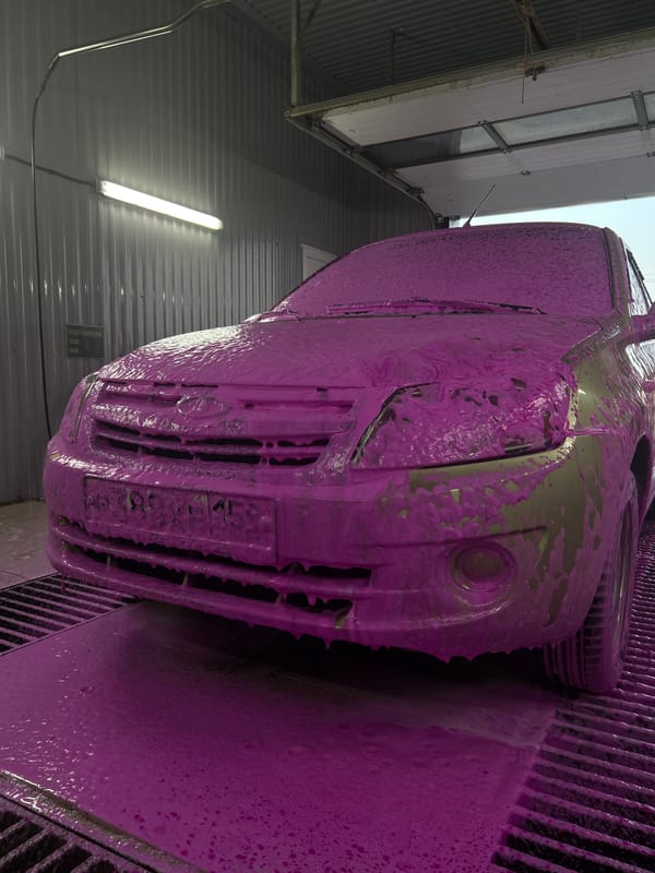 Foam car wash in progress at Chaikovsky outdoor wash station