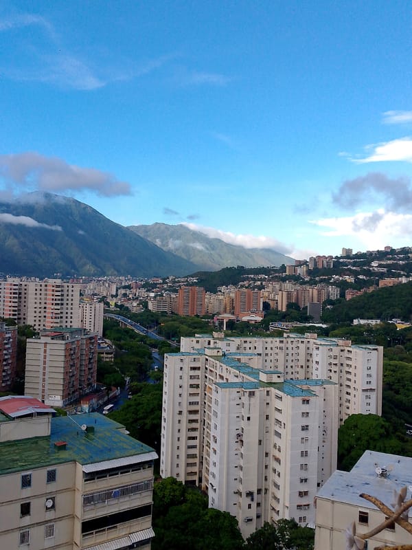 Aerial and street views of Caracas barrios after evening rain