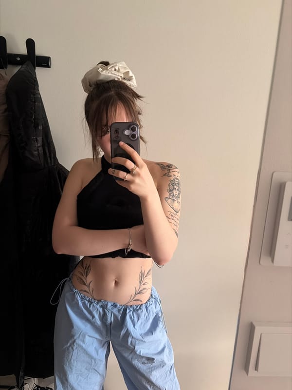Woman styles hair, takes selfies in Vantaa bathroom