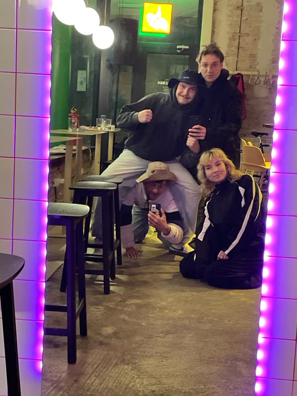 Group poses for photos at Belgrade restaurant