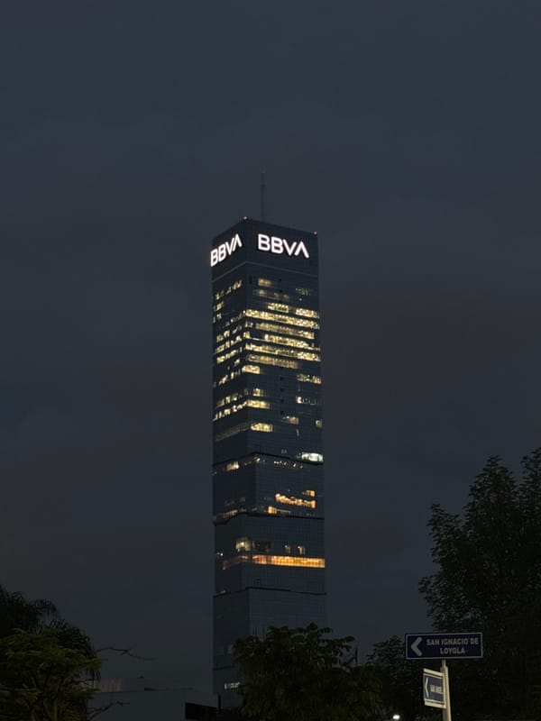 BBVA building illuminated at night in Tlaxcalancingo, Mexico