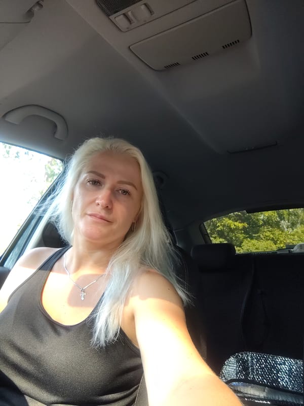 Candid car interior moment in Kyiv, August 2026