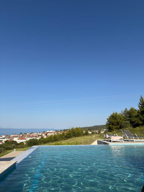Poolside afternoon at a coastal resort in Pallini, Greece