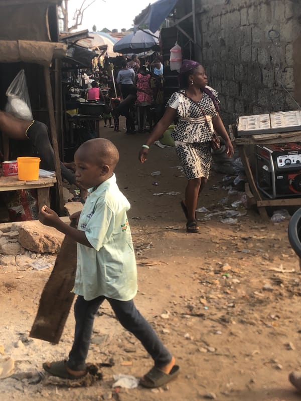 Daily street life documented across Nigerian market towns