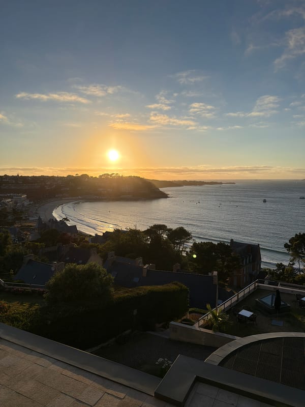 Golden hour around La Clarté's coastline and stone streets