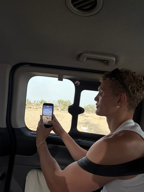 Inside a vehicle rolling through rural Morocco