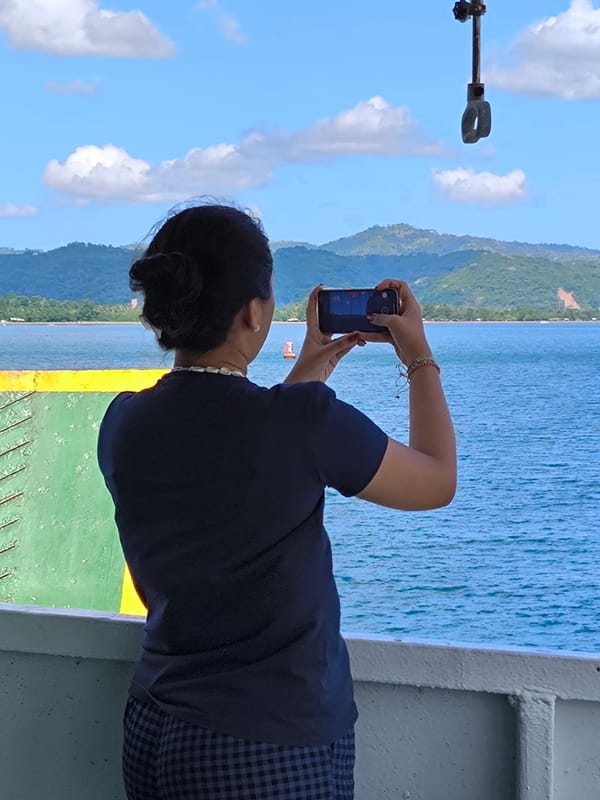 Ferry passengers capture routine maritime journey near Indonesian coastline