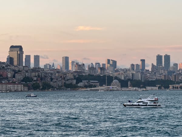 Istanbul skyline photographed across choppy Bosphorus waters
