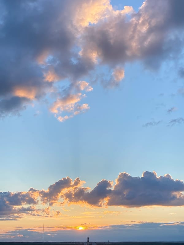 Sunset captured over Izhevsk cityscape from elevated viewpoint