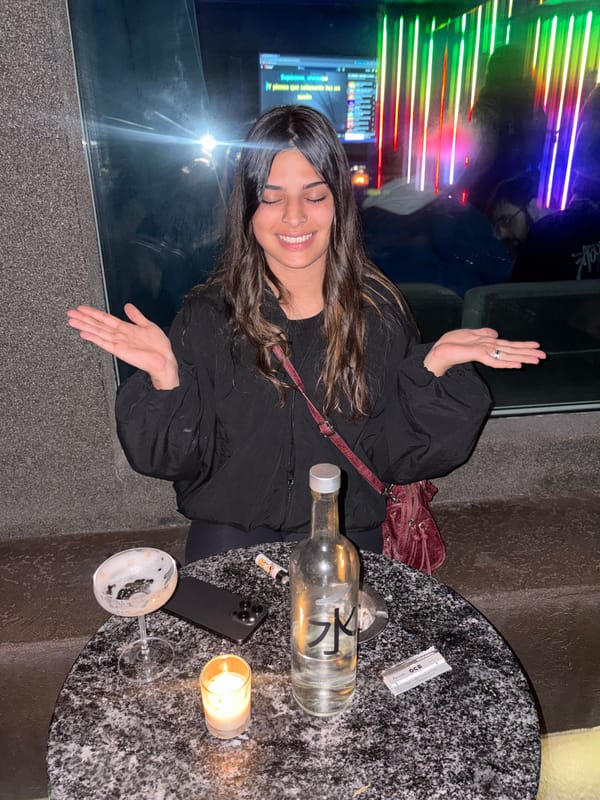 Woman enjoys cocktails at Buenos Aires venue early morning