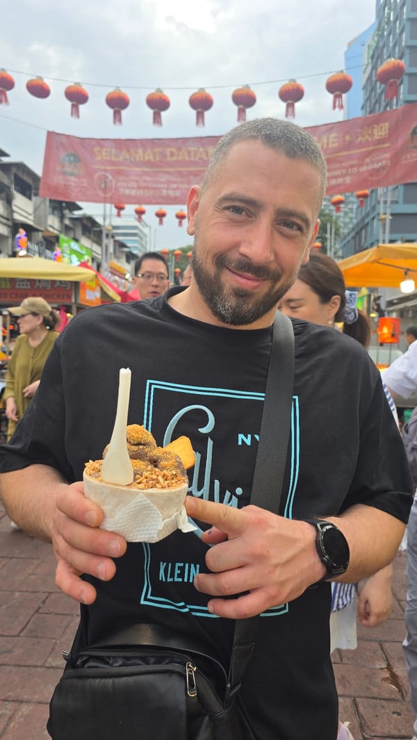 Street food scene and restaurant dining captured in Kuala Lumpur