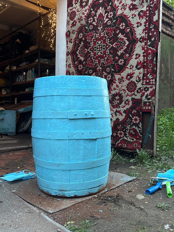 Wooden barrel spotted outdoors in Krasnoyarsk yard setting