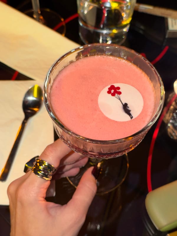 Upscale cocktail bar experience documented in Belgrade during rainy evening