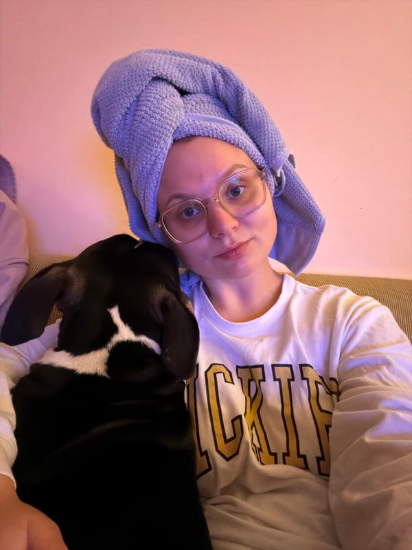 Person with dog photographed in Tel Aviv