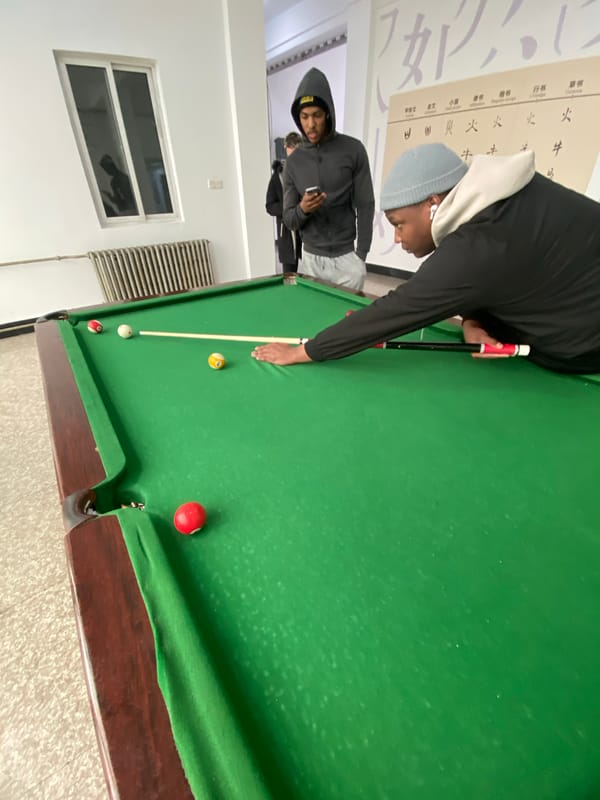 Morning scenes from Zhongtun show pool games and street views