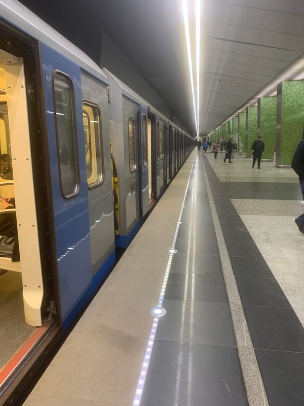 Moscow Metro train observed at platform with passengers aboard