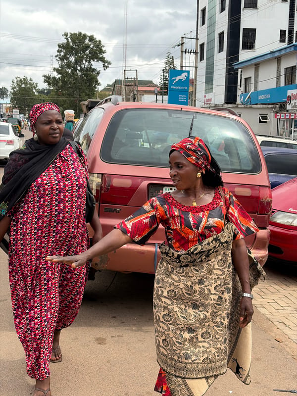 Midday street life and market activity in Jos, Nigeria