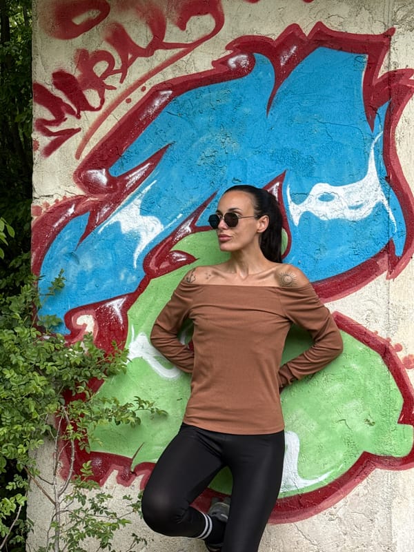 Woman conducts outdoor photoshoot across multiple Pleven locations