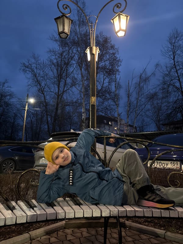Child photographed during blue hour in Chaikovsky, Russia