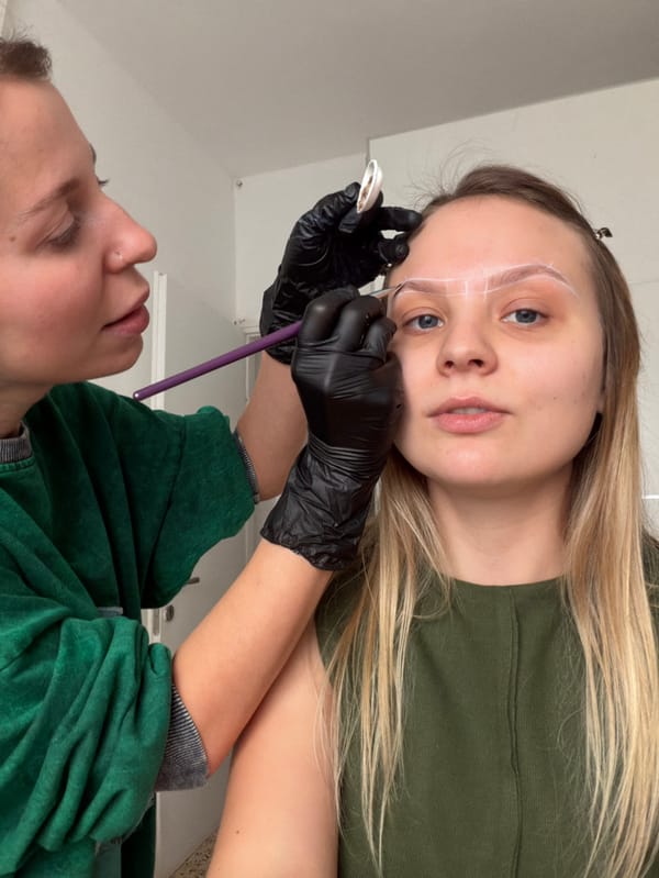 Indoor activities documented in Bat Yam: eyebrow treatment, cat interaction